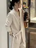 Diseño traje con cordones chaqueta pantalones de pierna ancha traje de dos piezas para mujer Primavera y Otoño nuevo traje casual suelto de alta calidad moda