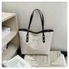 Lino europeo y americano gran capacidad lazo 2026 verano nuevo simple y elegante bolso de mano de un solo hombro bolso tote para debajo del brazo