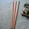 Fábrica al por mayor, juego familiar de palillos de madera artesanales chinos, palillos de madera portátiles, se pueden personalizar