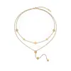 Collar de acero inoxidable de trébol de cuatro hojas de doble capa transfronterizo europeo y americano para mujer, lujo ligero y sensación de alta gama, joyería de cadena para la clavícula de acero de titanio color dorado