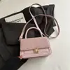 Bolsa quadrada pequena de trama 2026 nova bolsa de ombro moderna bolsa simples feminina pequena bolsa de mão bolsa feminina de comércio exterior bolsa transversal