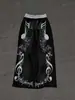 Pantalones Largos Casuales de Estilo Retro High Street con Estampado Bordado de Notas Musicales Cintura Elástica Unisex para Uso Diario