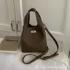 Bolsa de Mão Nicho Estilo Francês Bolsa Saco para Mulheres 2026 Novo Modelo Bolsa de Ombro para Deslocamento Diário Trabalho Bolsa Transversal Casual Retrô