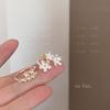 Corea del Sur Anillo de flor súper hada diseño nicho femenino exquisito de alta gama nuevo anillo abierto ajustable anillo