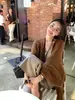 Moda de Hong Kong y Americana/Otoño/Invierno 2026 Suéter Delgado de Corte Holgado con Efecto Adelgazante, Atmósfera Suave y Estilo de Punto Relajado
