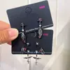 Amor y Espacio Profundo Qin Che Fantasía Oscura Pendientes de Ala Personalidad Dulce Fresca Nicho Lujo Ligero Estilo de Gama Alta Pendientes Nuevos de Moda