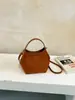 A mais recente bolsa de mão retrô, moderna e estilosa para mulheres, é um item quente no mercado internacional.. É uma bolsa tipo balde de grande capacidade que pode ser carregada como bolsa de ombro ou bolsa transversal, e é versátil o suficiente para combinar com qualquer roupa.