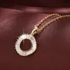 Venta caliente transfronteriza nuevo simple elegante lujo ligero alta calidad redondo anillo colgante Super Brillante incrustado circonita temperamento collar
