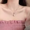 Collar Colgante de Concha con Lazo Dulce para Mujer Sensación de Alta Gama Lujo Ligero Nicho Cadena para Clavícula Cadena para el Cuello Versátil de Moda Accesorios