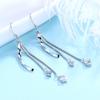 Pendientes de circonita de ola directos de fábrica Runxin para mujer, moda estilo coreano, todo a juego, joyería pequeña, pendientes largos de borla giratoria