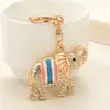 Llavero Colgante de Elefante Esmaltado a Rayas Creativo Multicolor Transfronterizo con Pedrería, Anillo Llavero de Coche de Elefante Africano Moderno y Único