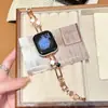 Pulsera hueca de trébol de cuatro hojas con correa de metal, adecuada para Apple Watch 11 S12 Huawei Fit5 Xiaomi Redmi