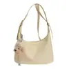 Bolso de mano de nicho de moda estilo coreano para mujer, nuevo modelo primavera 2026, elegante, de lujo ligero, versátil, bolso de hombro y cruzado simple