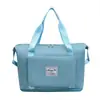 Bolsa deportiva portátil de gran capacidad transfronteriza para fitness, bolsa de viaje diagonal de corta distancia para mujer, bolsa de hombro repelente al agua para yoga, venta al por mayor