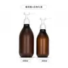 Botella blanca de bomba cosmética de 300 ml en stock, botella vacía de gel de ducha y champú de alta estética de 500 ml