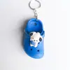 Llavero de Zapatos de Cueva Caliente Transfronterizos Mini Dibujo Animado Zapatitos Pequeños Llavero de Coche Colgante para Pareja Regalos Venta al por Mayor