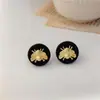 Pendientes de la serie de pedrería negra retro coreana pendientes Pendientes de perla con forma de cola de pez y lazo oscuro europeos y americanos venta al por mayor