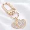 Lujo Ligero Chapado en Oro Full Diamante Charm Hebilla en Forma de D Colgante Hueco en Forma de Corazón Accesorios para Bolsos Llaves Fábrica Stock Mayorista