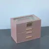 Nuevo cajón de hardware de alta gama caja de joyería de cuero PU fabricantes de Jinhua caja de joyería con ventana de 4 capas espejo de tocador incorporado
