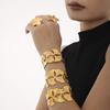 Pulsera Xinyixin de Acero Inoxidable con Hoja de Ginkgo Diseño Exagerado de Abertura Hueca Viento Europeo y Americano Chapado en Oro de 18k para Mujer