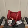 2026 Nuevo Verano Casual para Mujer Simple Retro Moda Remache Simple Correa Ancha Hombro Único Cruzado Bolso Pequeño Cuadrado