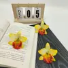 Venta al por mayor de fábrica Venta caliente transfronteriza Flores artificiales Orquídeas tailandesas Sombreros de flores Zapatos con flores Tocados festivos Flores para la cabeza Flores falsas