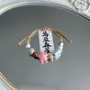 Pulsera de Cerámica Tejida con Diseño de Nicho, Sensación de Alta Gama, Dulce y Versátil para Mujeres, Pulsera Artística de Concha Marina, Joyería de Costa