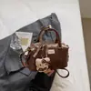 Bolsa pequena de alta qualidade e estilosa para mulheres, nova coleção outono 2026, grande capacidade, bolsa de ombro versátil, bolsa retrô para o dia a dia
