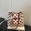 Bolso tote de lunares estilo coreano 2026 nuevo para mujer, bolso de hombro de gran capacidad para el trabajo, bolso de mano versátil de nicho