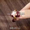 Anel Aberto Banhado a Ouro com Pérola Sintética Vietnamita Transfronteiriço para Mulheres, Anel de Flor com Gotejamento de Óleo em Ouro Sintético Tendência