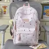 Mochila linda de niña con estrellas estampadas por todas partes, adecuada para estudiantes de secundaria y preparatoria, elegante y ligera