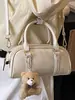 2026 Nuevo Modelo Bolso de Hombro Texturizado de Color Sólido de Moda Elegante para Mujer Bolso Boston de Moda Bolso Cruzado de Moda
