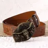 Cinturón de PU para hombre cinturón de alta gama con cabeza de vaca cinturón retro repujado para hombre hebilla de placa de personalidad en stock al por mayor