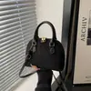 Bolsa de Mão da Moda Tendência de Nicho para Mulheres 2026 Novo Estilo Versátil Bolsa Concha Elegante Bolsa Transversal para o Dia a Dia