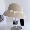 Sombrero con pantalla de lámpara de lazo estilo Hepburn para mujer, nuevo sombrero de pescador casual versátil de verano, sombrero de paja con protección solar