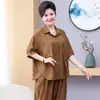 Conjunto de verano para madre de mediana edad, talla grande, nuevo conjunto elegante de dos piezas: camisa de manga corta con solapa y pantalones anchos holgados