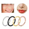 Pendientes de aro para la nariz cerrados de acero inoxidable 316L transfronterizos joyería para perforaciones Europa y Estados Unidos fábrica de aros para la nariz sin costuras en stock venta al por mayor
