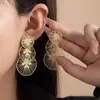 Pendientes Irregulares Huecos Transfronterizos Europeos y Americanos de Aguja Plateada Pendientes Personalizados Creativos de Hoja de Loto Pendientes de Sentido de Diseño Exagerado para Mujeres