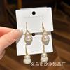 Corea del Sur Dongdaemun Nuevo Zircón Micro-incrustado Perla Calabaza Elegante Moda Sentido del Diseño de Lujo Ligero Aretes