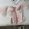 Top corsé rosa con estampado de espina de pez para llevar por fuera, elegante y adelgazante