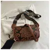 Elegante bolso de cuero suave para mujer de mediana edad 2026 nuevo modelo bolso de hombro cruzado bolso para teléfono de cuero genuino bolso cruzado pequeño casual