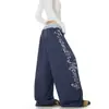 Pantalones casuales de retazos con estampado de letras desgastado estilo retro americano, unisex streetwear holgados de pierna ancha con pierna curva