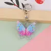 Novo Chaveiro Borboleta Colorida Fofa 2D Pingente para Mochila Escolar de Menina Acrílico Encanto Acessório de Desenho Animado Fofo
