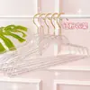 Perla de internet acrílica linda cristal percha ropa mujer sin costuras hogar plástico transparente tienda de ropa percha polvo dorado
