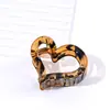 Pinza de Agarre para Cabello con Forma de Corazón Hueco Mediano de 5 cm Estampado de Leopardo Personalizado Pinza para el Cabello de la Parte Posterior de la Cabeza Cola de Caballo Semialta Pinza de Tiburón