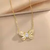 Collar de acero y titanio de estilo japonés-coreano para mujer, cadena de clavícula de alta gama, sin color, ligero, de lujo, con trébol de cuatro hojas a juego.