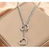 Anillo en Forma de Corazón con Cadena Deslizante para Mujer Venta Caliente Transfronteriza Estilo Punk Hecho a Mano Personalizado Joyería de Gama Alta al por Mayor en Yiwu