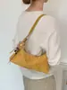 Retro estilo coreano, bolsa de mano de gamuza de nicho para mujer, nueva colección 2026, adecuada para el uso diario y para ir al trabajo, se puede llevar en la mano o usar como bolso de hombro o bolso cruzado