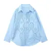 Al por mayor Verano 2023 nuevo estilo europeo y americano para mujer manga larga azul bordado hueco suelto camisa