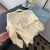 Blusa Camiseta Blanca Fina Ligeramente Transparente Estampada de Manga Larga Protección Solar para Mujer Popular Verano Hermoso Top Exportación Venta al por Mayor